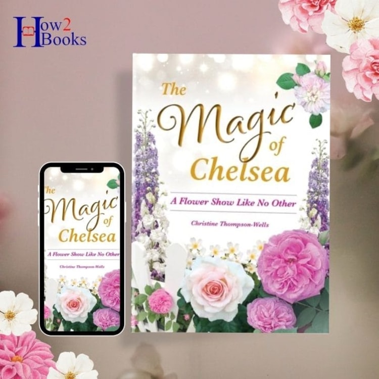 The magic of chelsea book and phone next to flowers