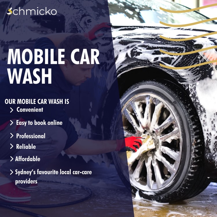 A man washing a car with a hose