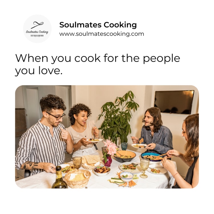 A group of people sitting around a table eating food