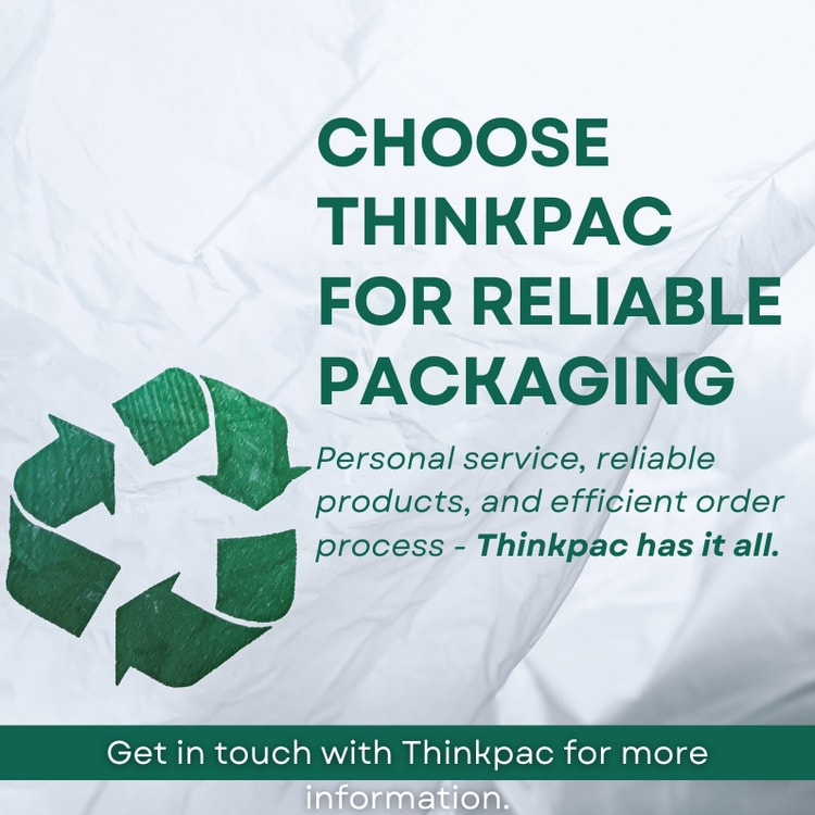 A white poster with a green recycle logo