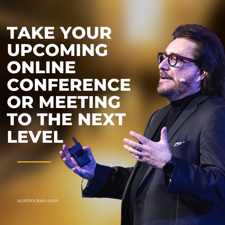 A man in a suit and glasses is speaking