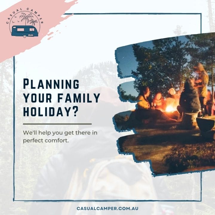 A group of people sitting around a campfire