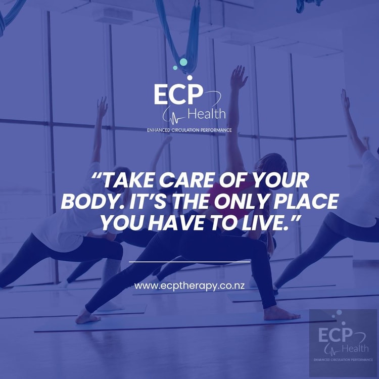 A group of people doing yoga in a gym