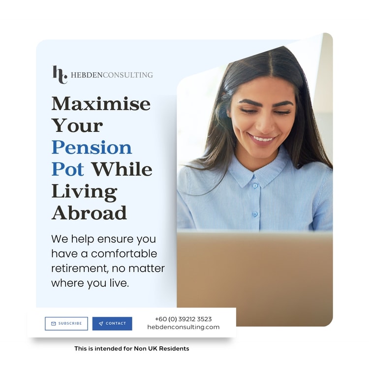 A woman sitting in front of a laptop computer