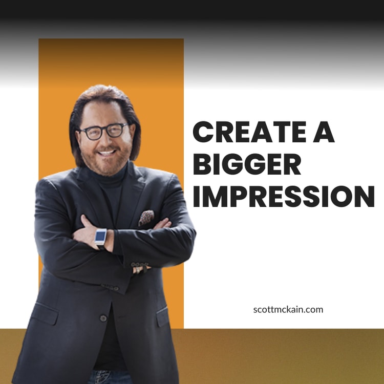 A man with his arms crossed standing in front of a sign