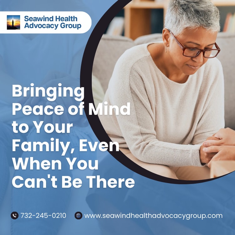 A woman sitting on a couch looking at a book