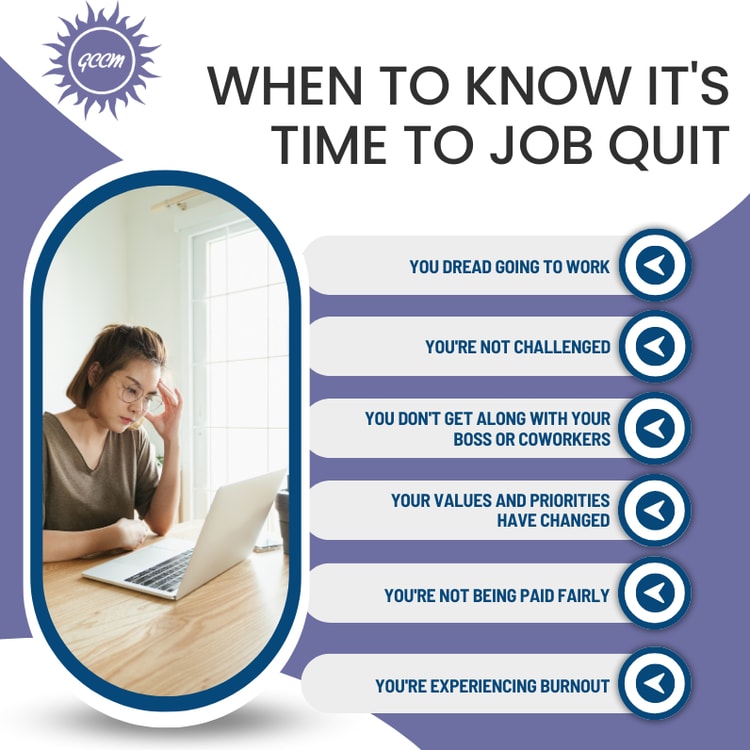 A woman sitting in front of a laptop computer