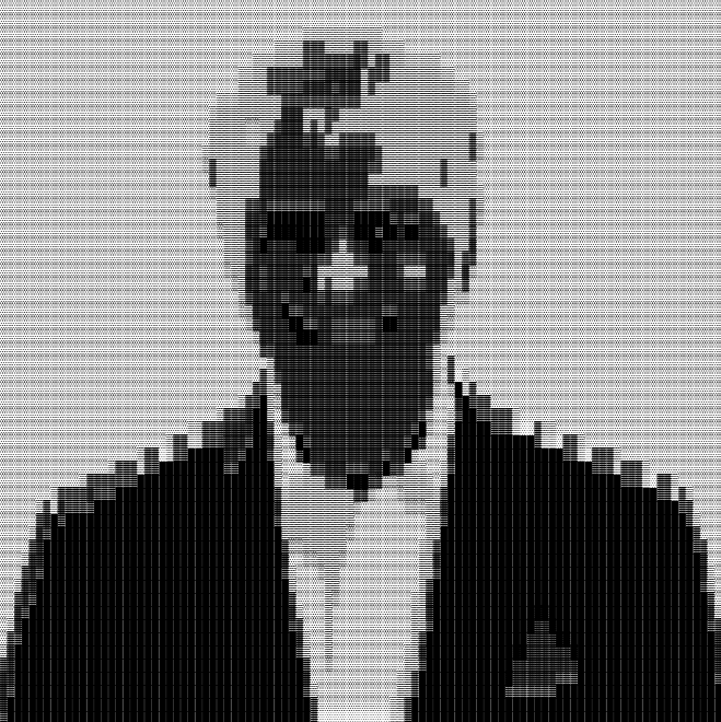 A black and white photo of a man wearing a turban