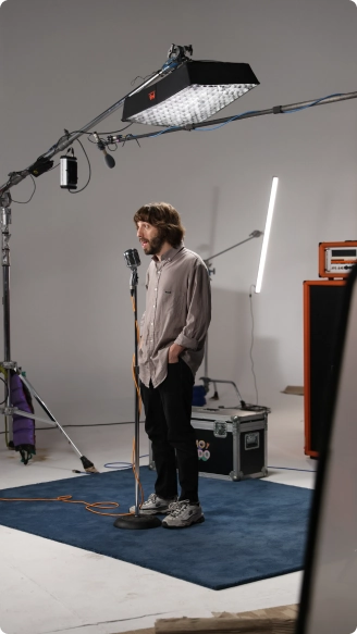 A man standing in front of a microphone