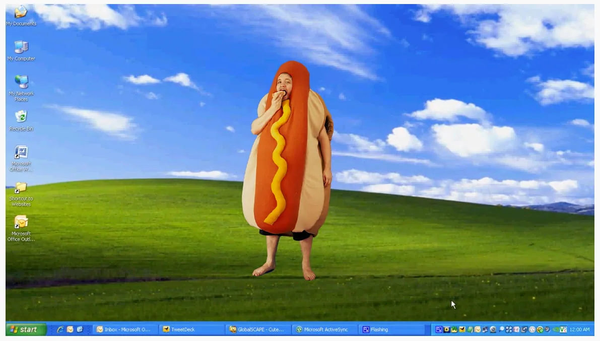 A computer screen with a picture of a person dressed as a hot dog