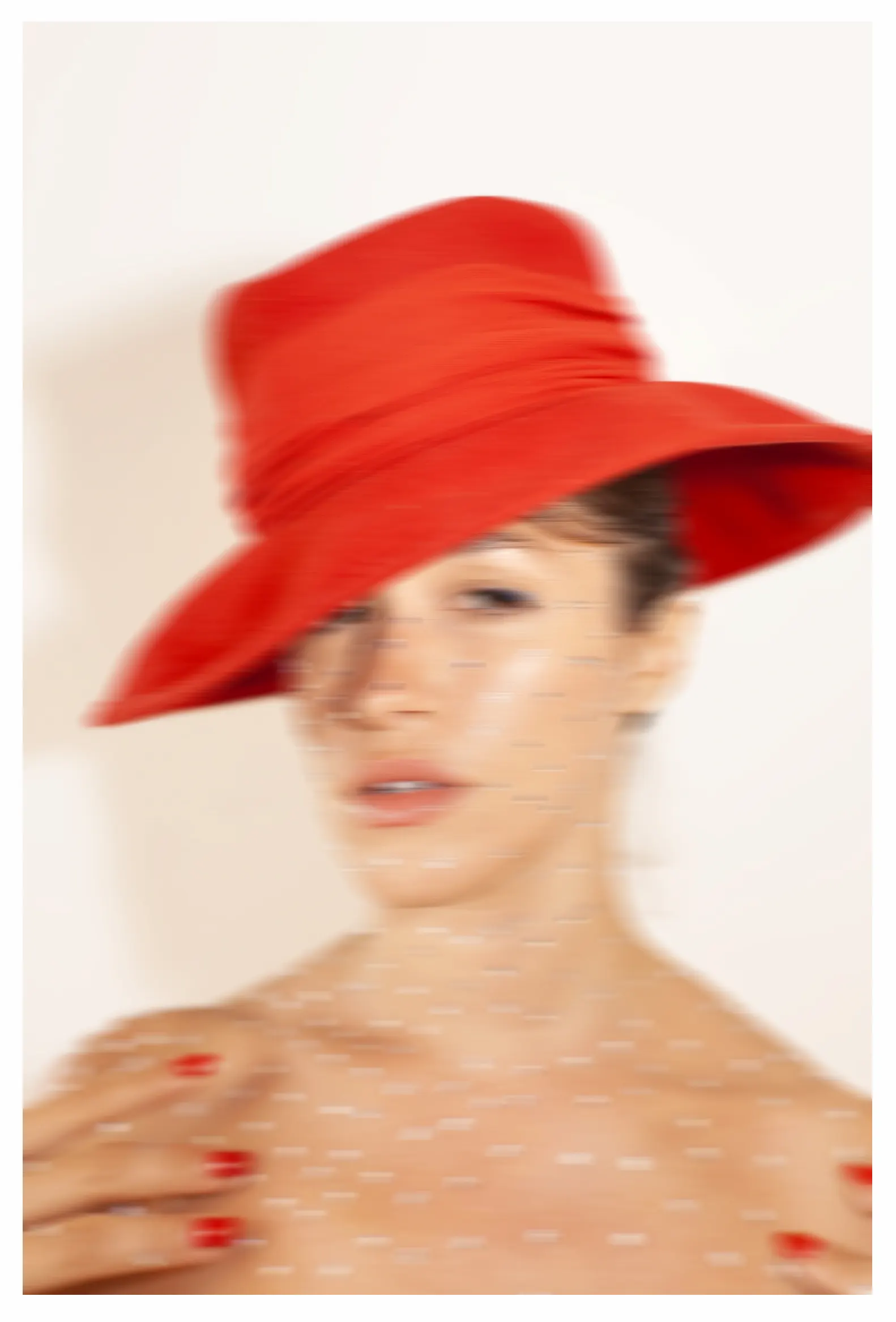 A woman with a red hat on her head