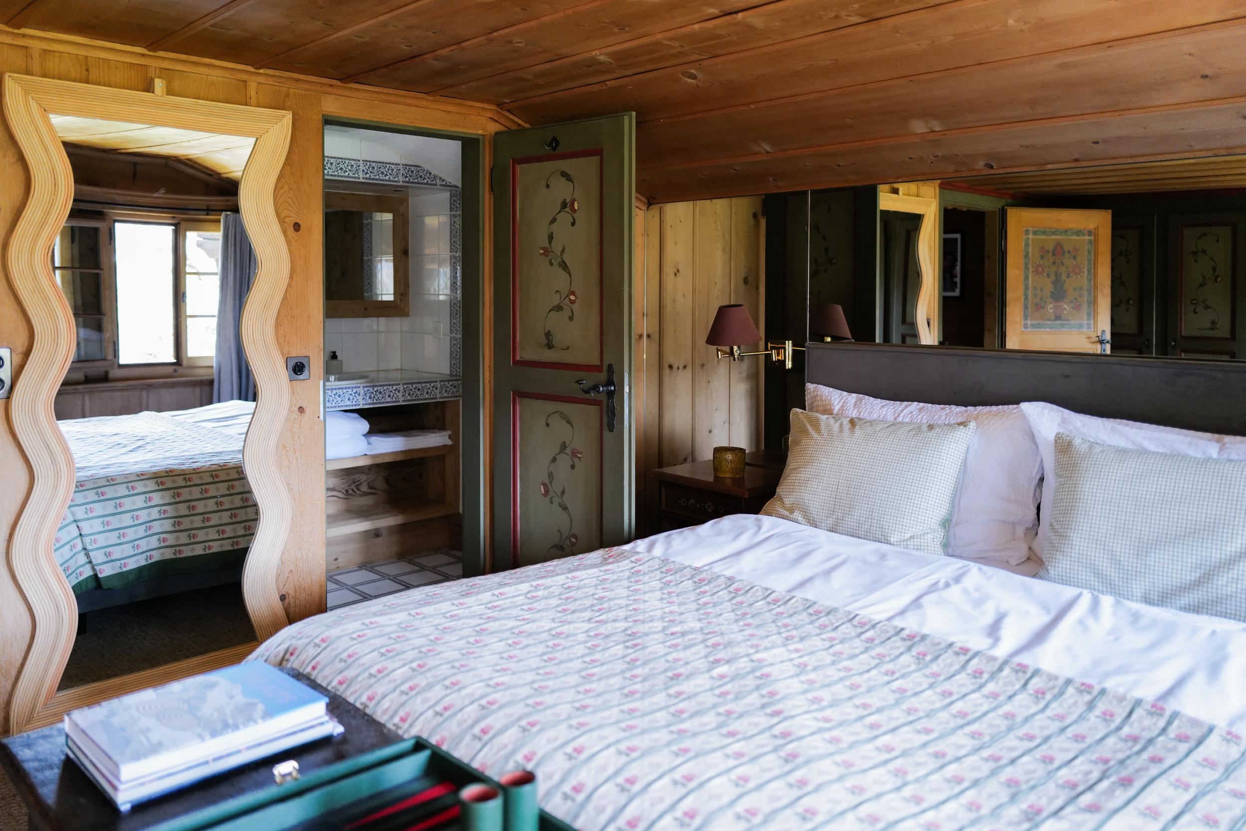 Le Chalet Saanen_Master front_with bath and mirror from angle_April2025
