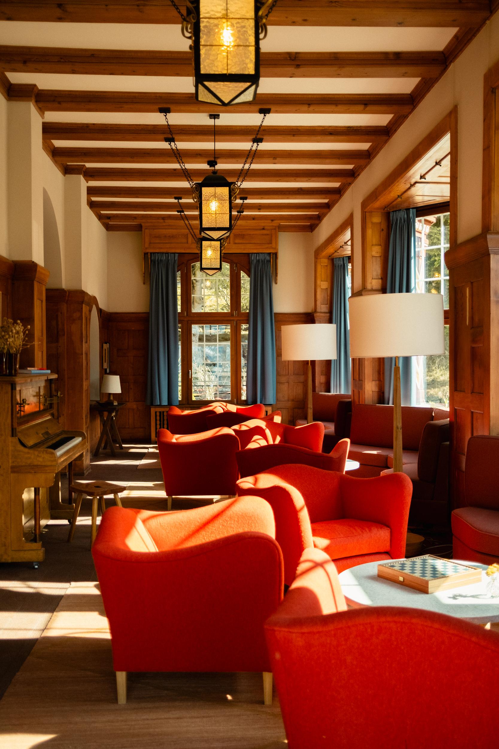 Grand Hotel Belvedere lobby with blue lounge chairs