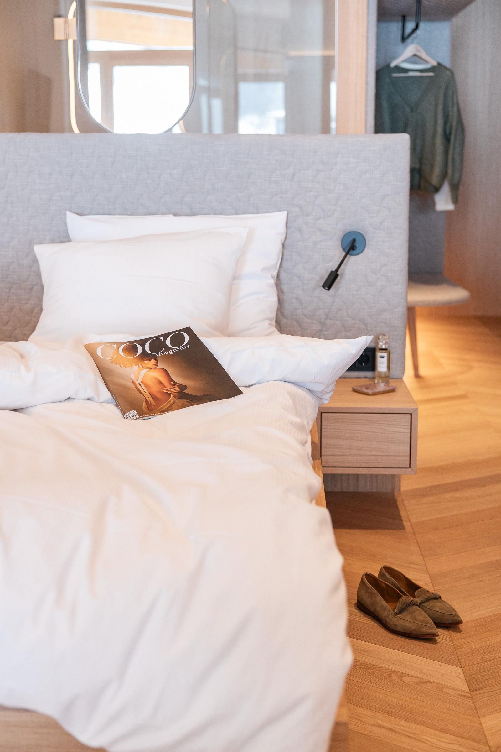 Nesslerhof bedroom with magazine
