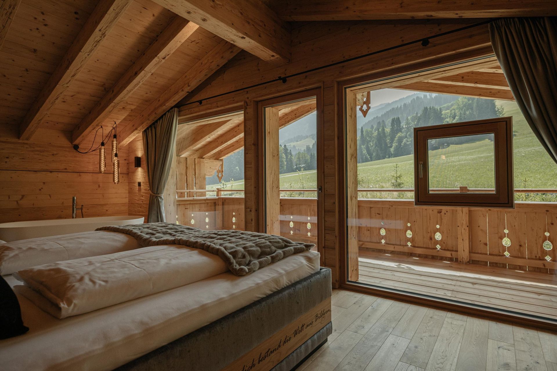 Hygna Chalets bedroom summer view
