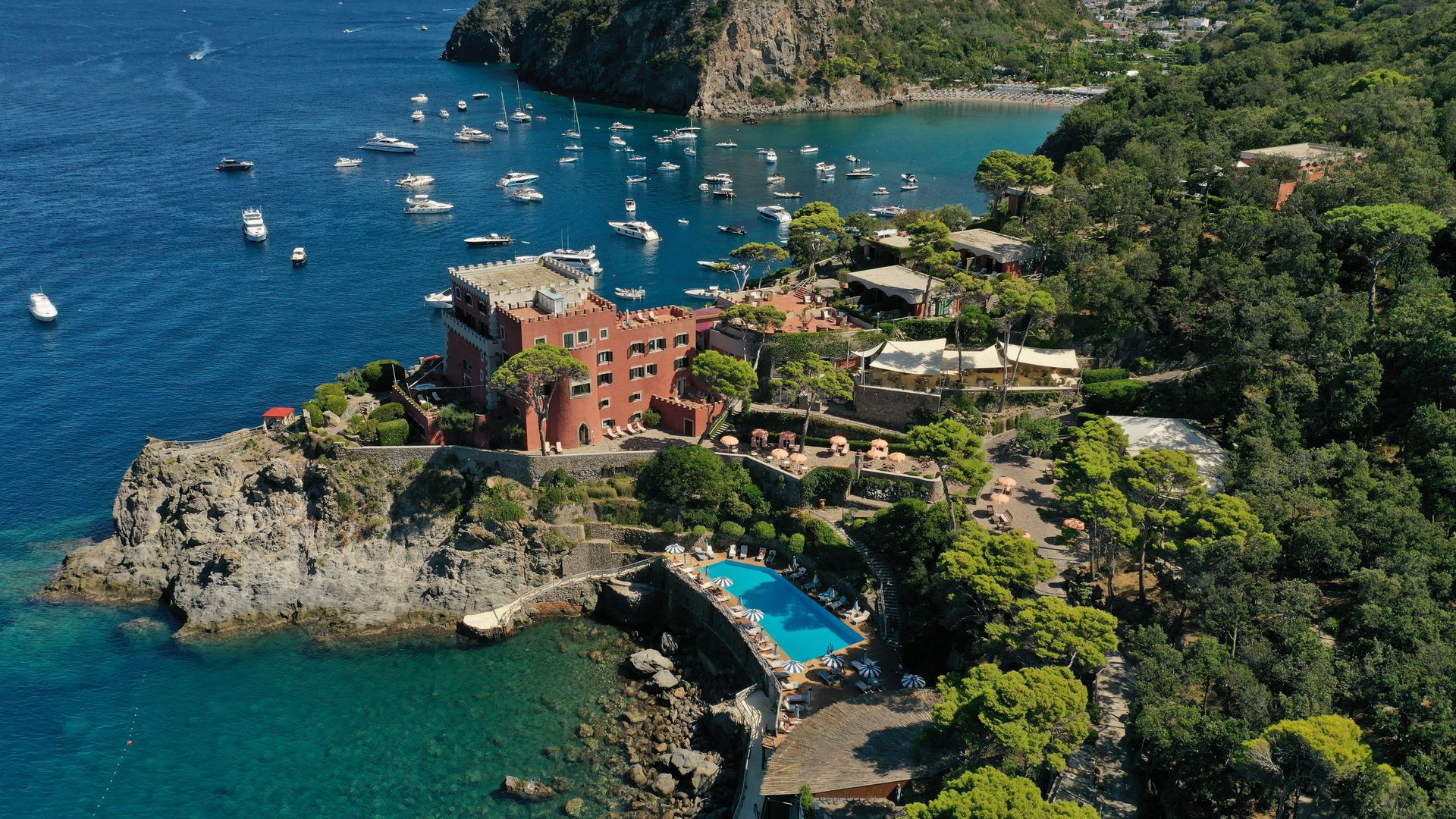 mezzatorre-hotel-and-thermal-spa-airview-on-the-hotel-swimming-pool-and-sea-with-sailing-boats