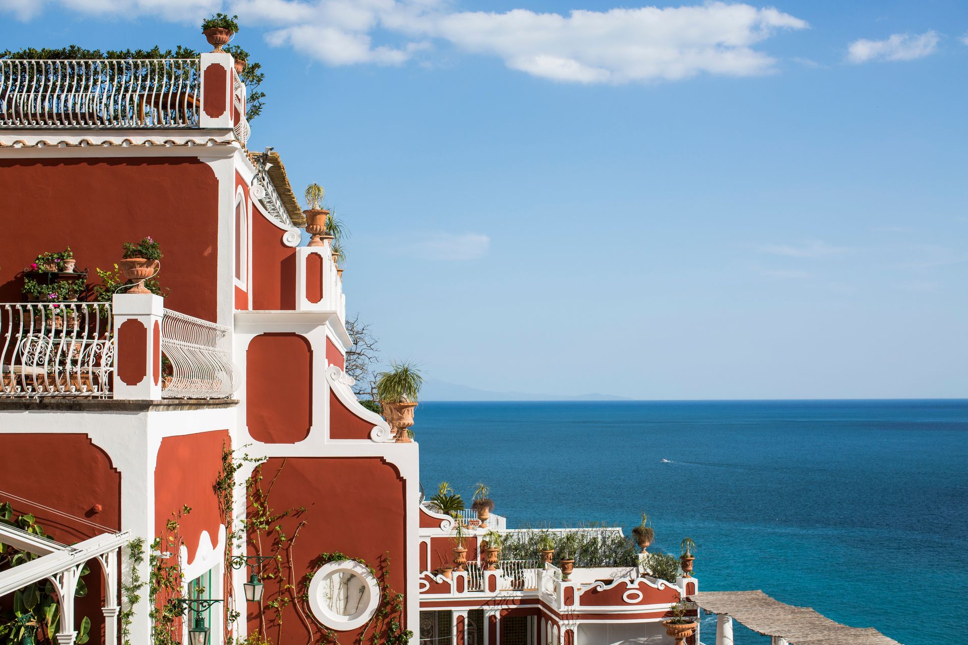 Le Sirenuse Red Facade and Sea