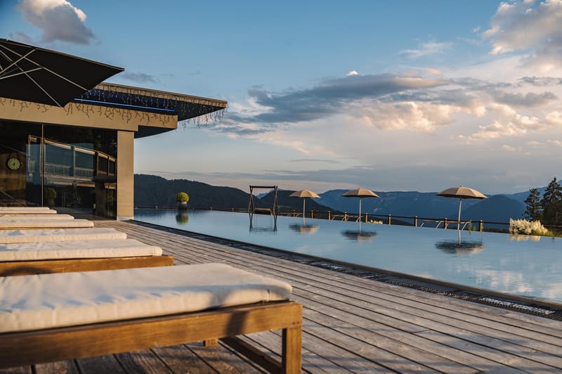 Chalet Mirabell_summer. Pool view from sun lounger
