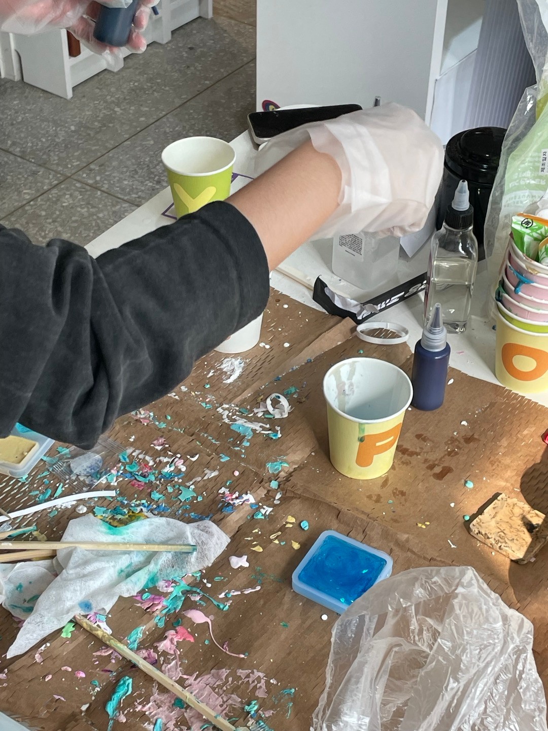 Pouring resin into the mold and letting it cure.