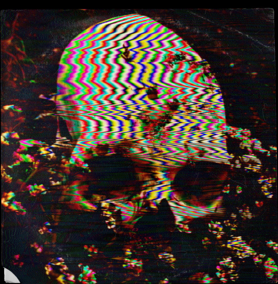 A multicolored image of a skull on a black background