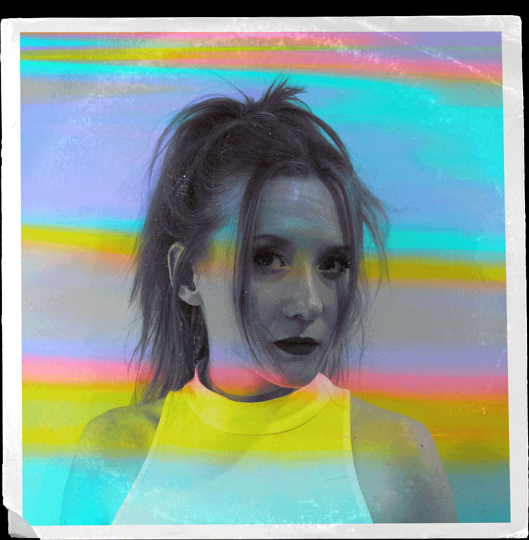 A woman with black makeup and a colorful background