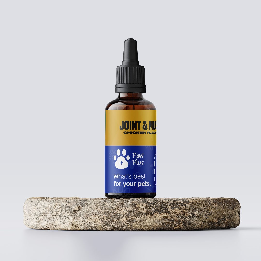 A bottle of joint oil sitting on top of a piece of wood