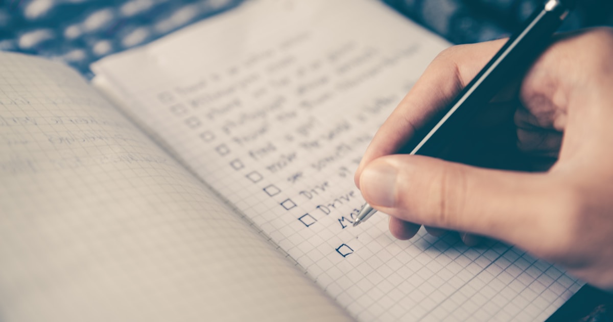 Goal setting notebook with pen