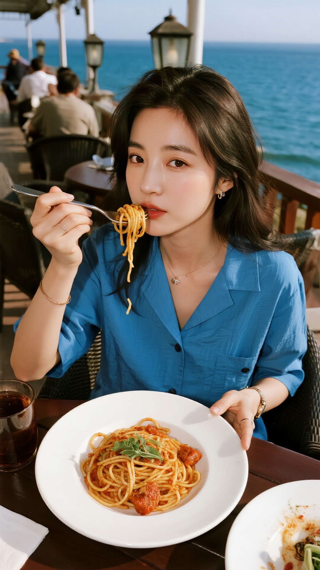 Women eating pasta